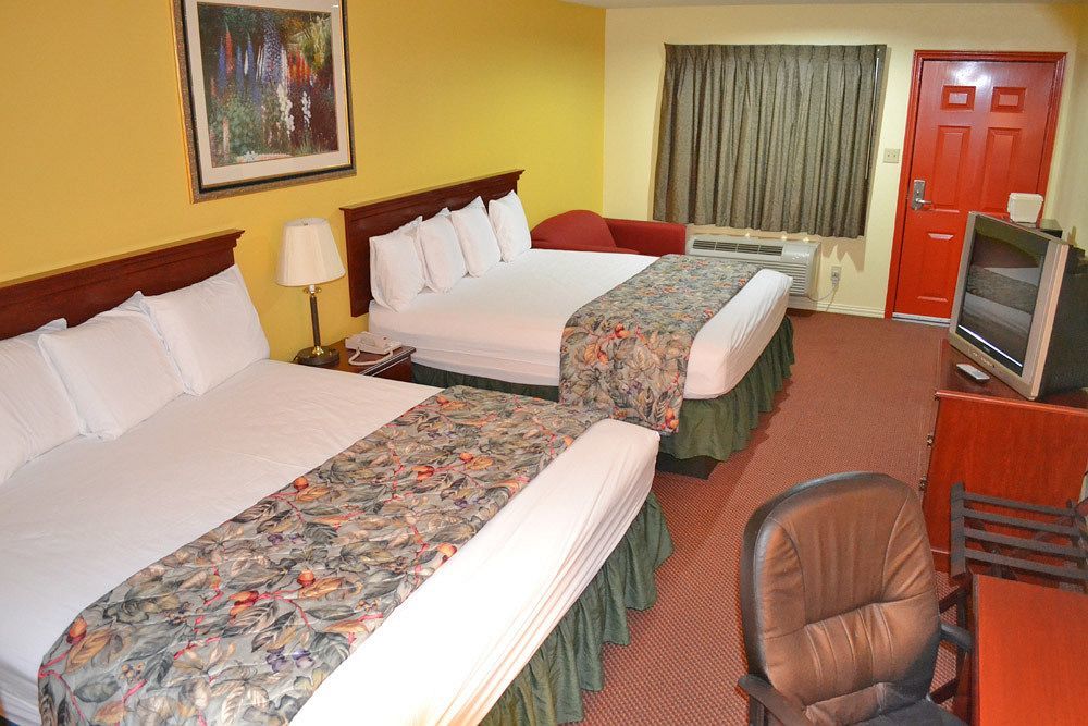 Executive Inn & Suites מגנוליה מראה חיצוני תמונה