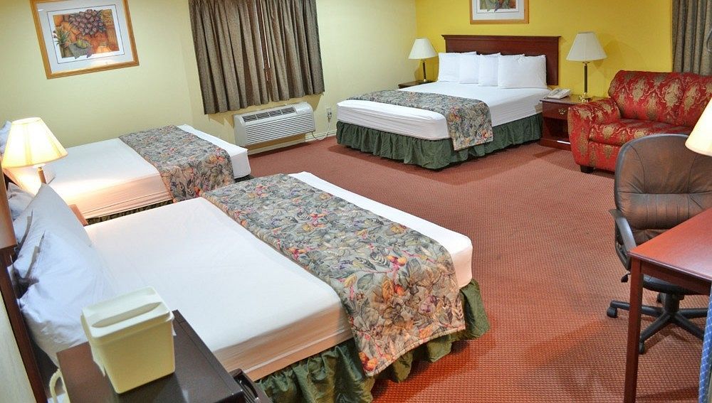 Executive Inn & Suites מגנוליה מראה חיצוני תמונה